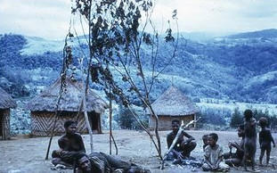 Kuru patient and family, in a village near Okapa, 1968. Photo AJR.