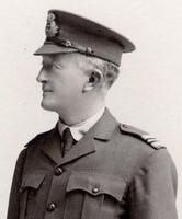 Dr E W Morris in 1915 wearing RAN(Staff Surgeon) Surgeon uniform, but as his unit was working on land it is in khaki rather than blue/black. Jodhpurs, leather gaiters, spurred boots and a riding crop complete the outfit.